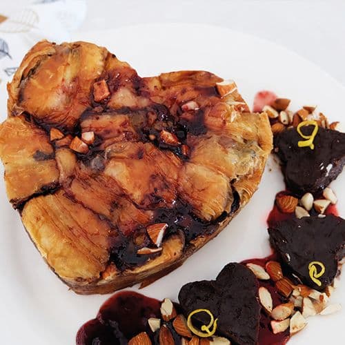 Dark Chocolate Croissant Pudding with Brandy Soaked Cherry Image